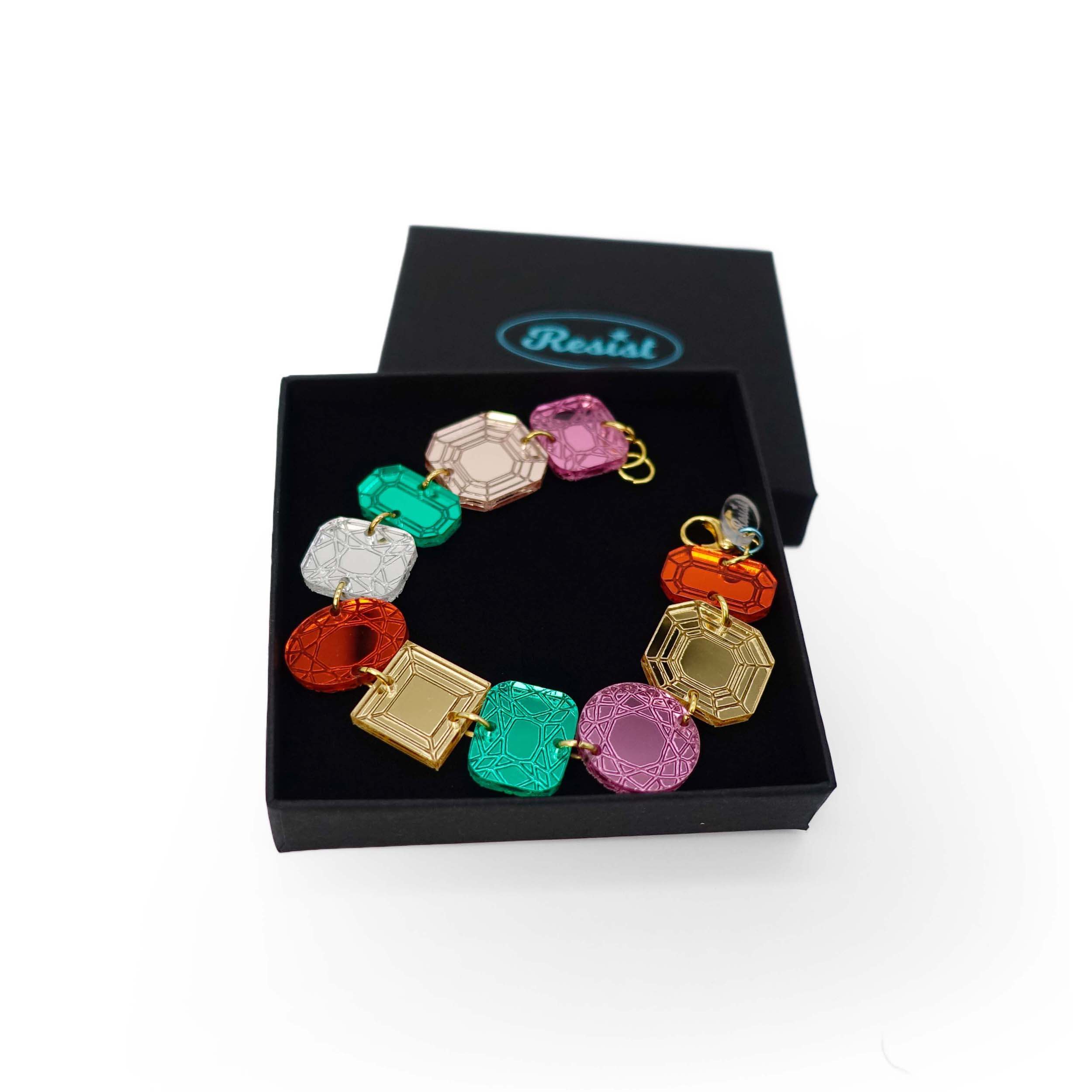 Funky Jewel mismatched gem bracelet, designed by Sarah Day as part of the Austerity Jewels collection, shown in a Wear and Resist gift box. £2 goes to Women for Refugee Women charity. 
