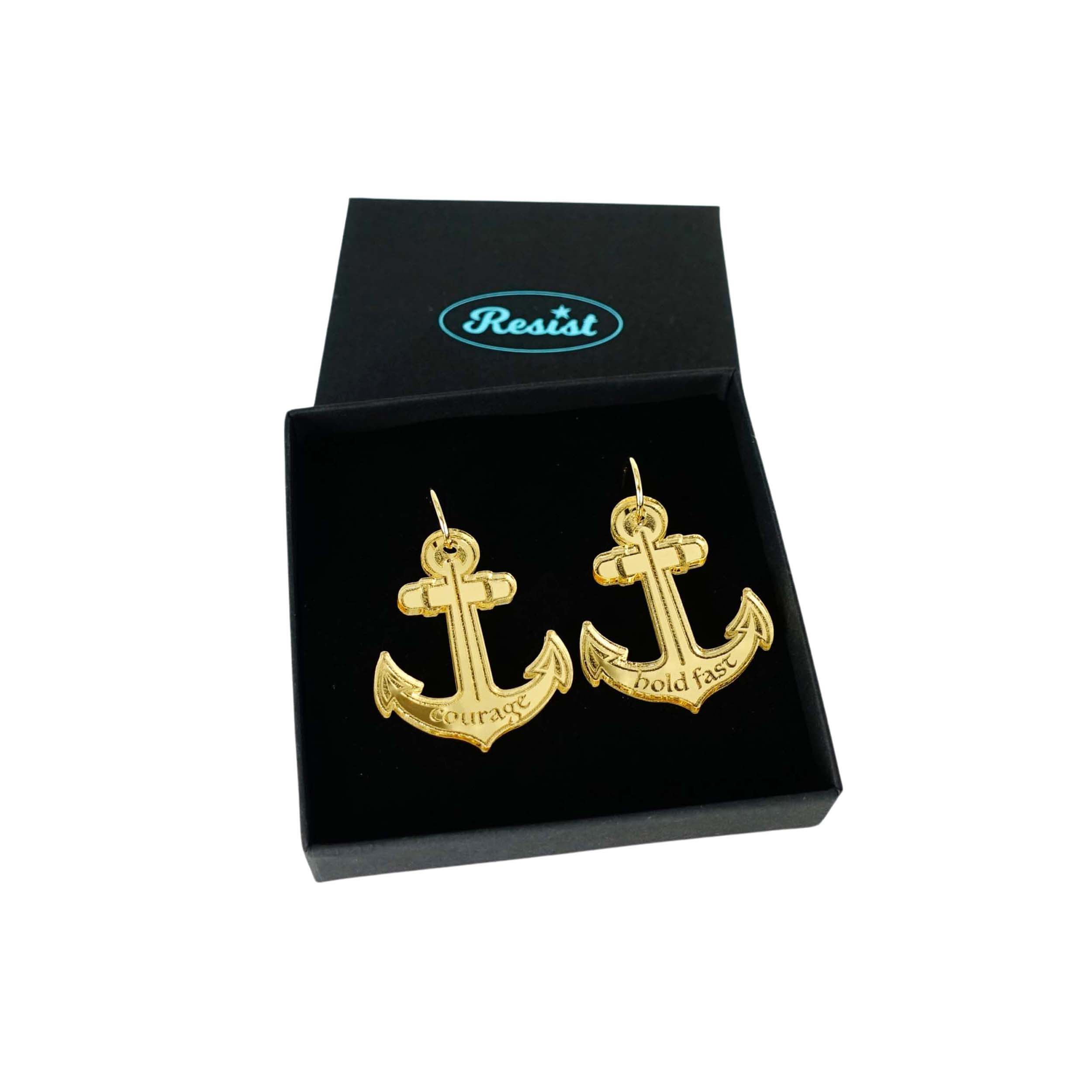 Courage and Hold Fast anchor hoop earrings in gold mirror, shown in a Wear and Resist gift box.