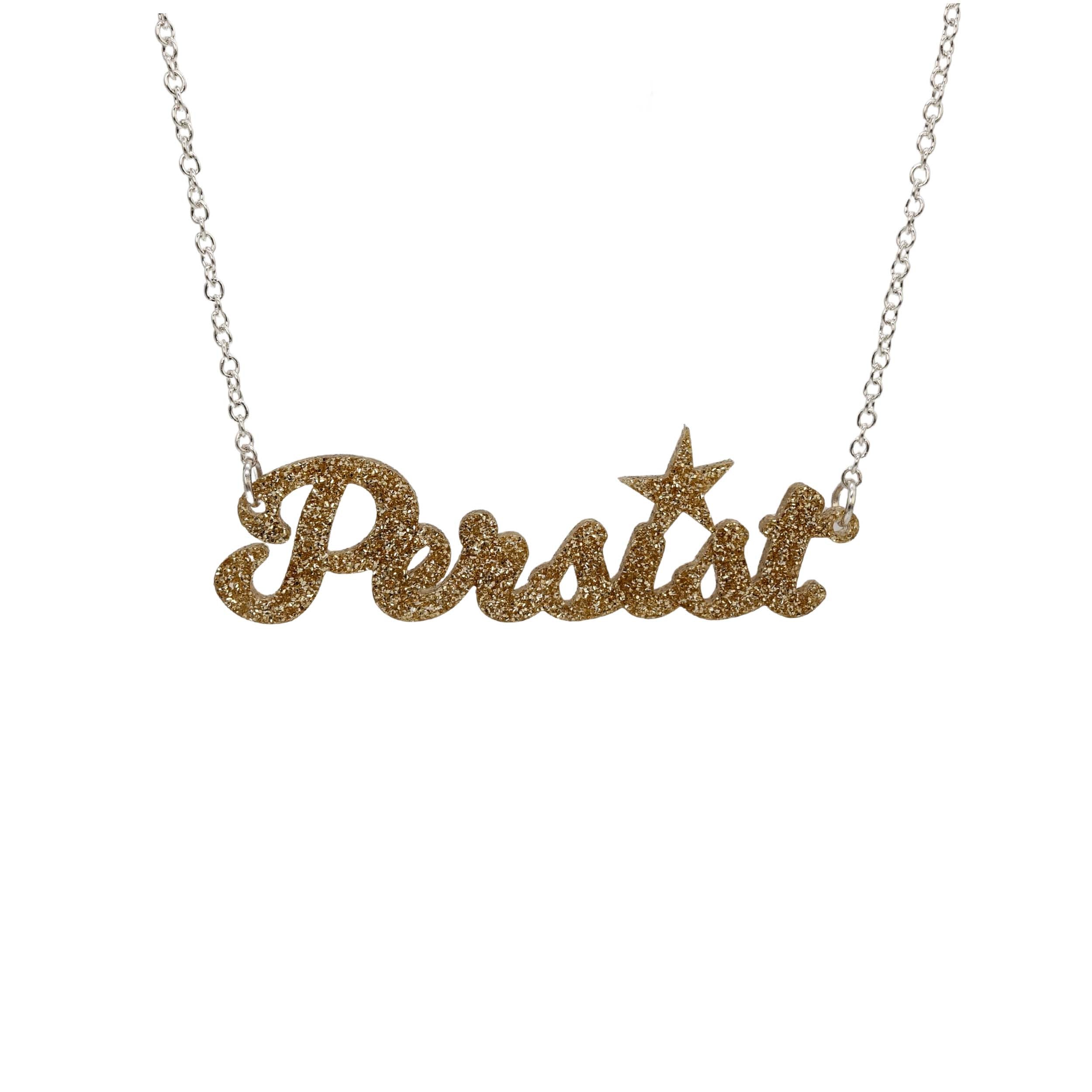 Persist necklace in script font in gold glitter, shown hanging on a white background.