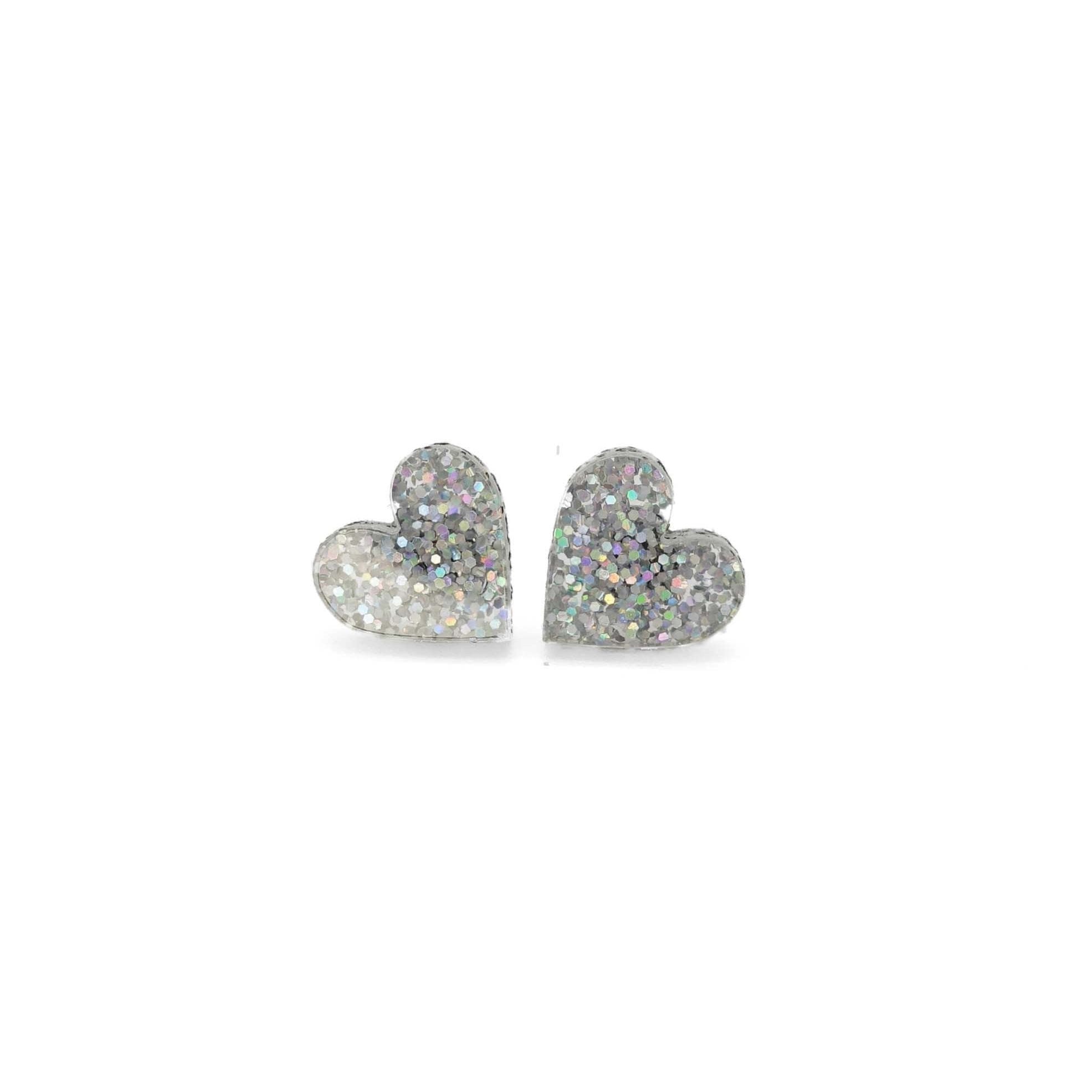 Little heart earrings in silver glitter.