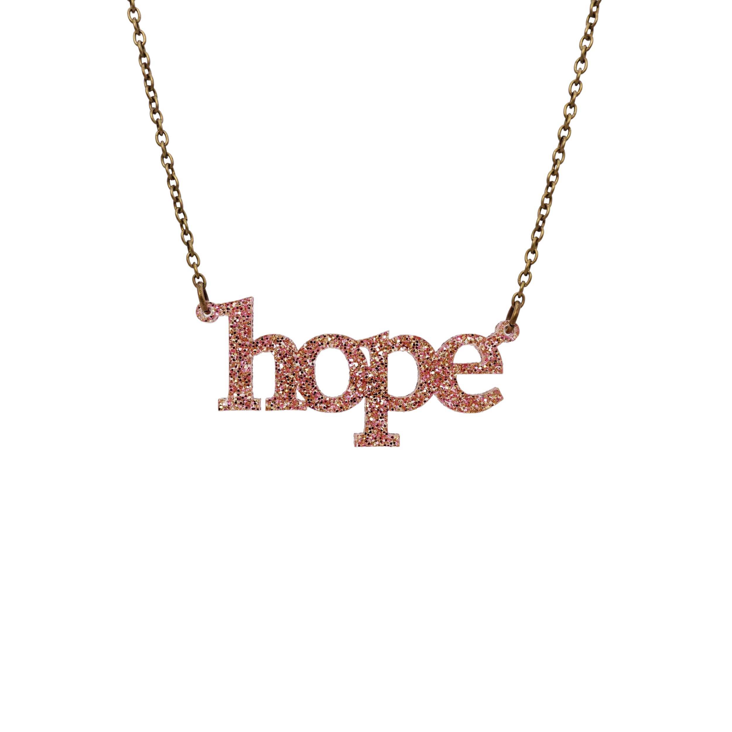 Hope necklace in pink fizz glitter, shown hanging against a white background.