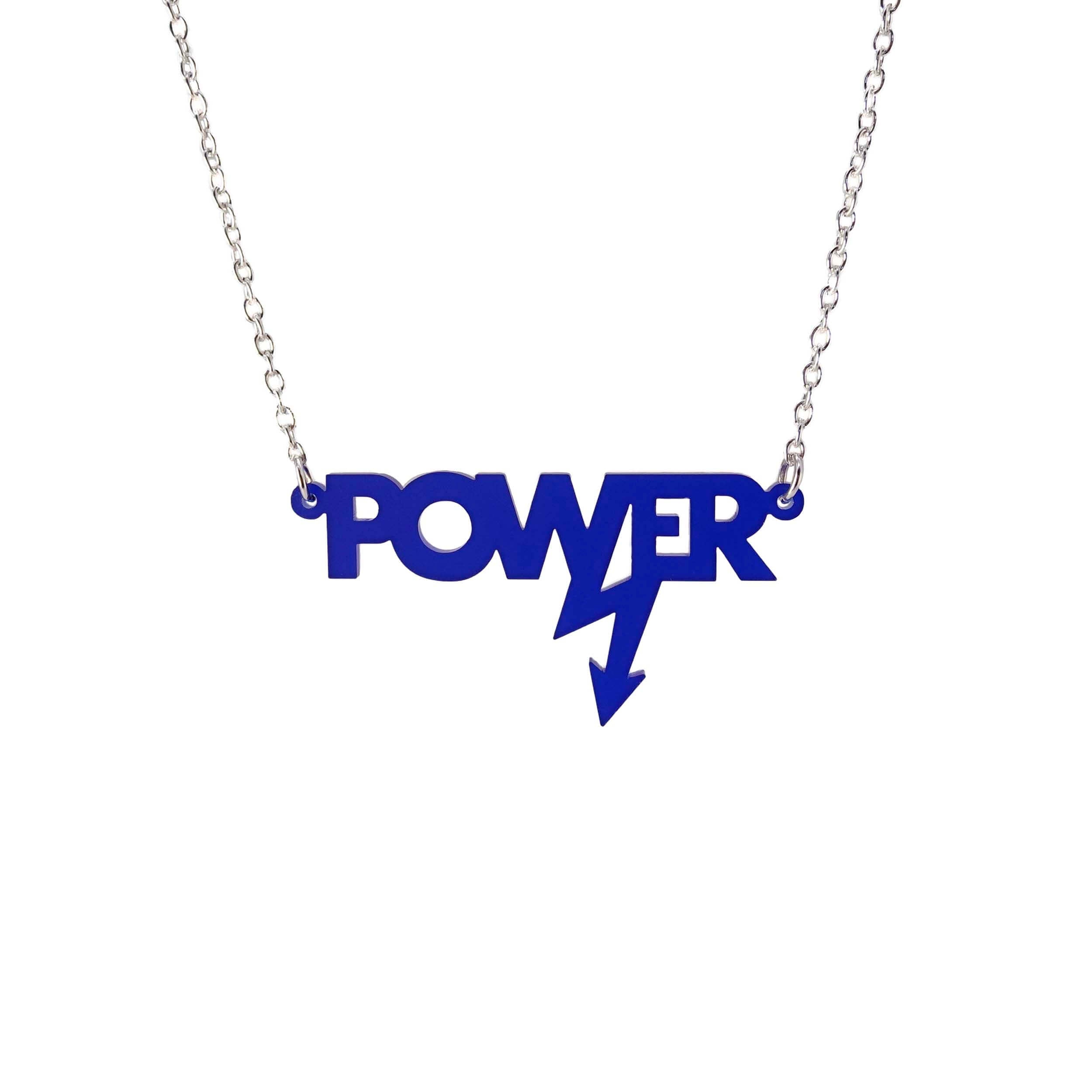 Mini power necklace in indigo frost shown hanging on a silver chain against a white background. Designed in collaboration with Mary Beard for her book Women and Power.