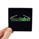 Iridescent Feminist necklace shown in a Wear and Resist gift box.