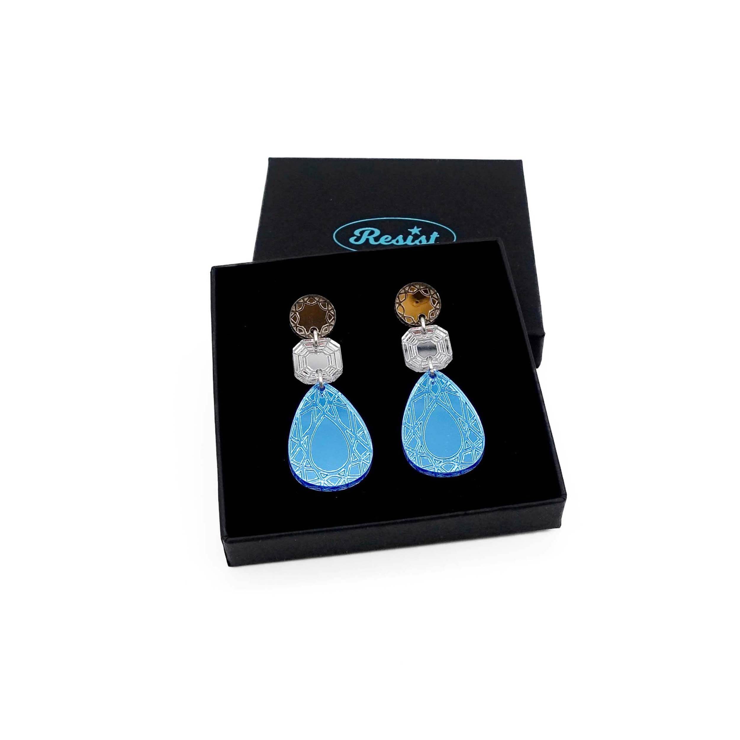 Large Belle Époque Jewel drop earrings in Cool Sky: sky blue, silver and bronze colours shown in a Wear and Resist gift box. 