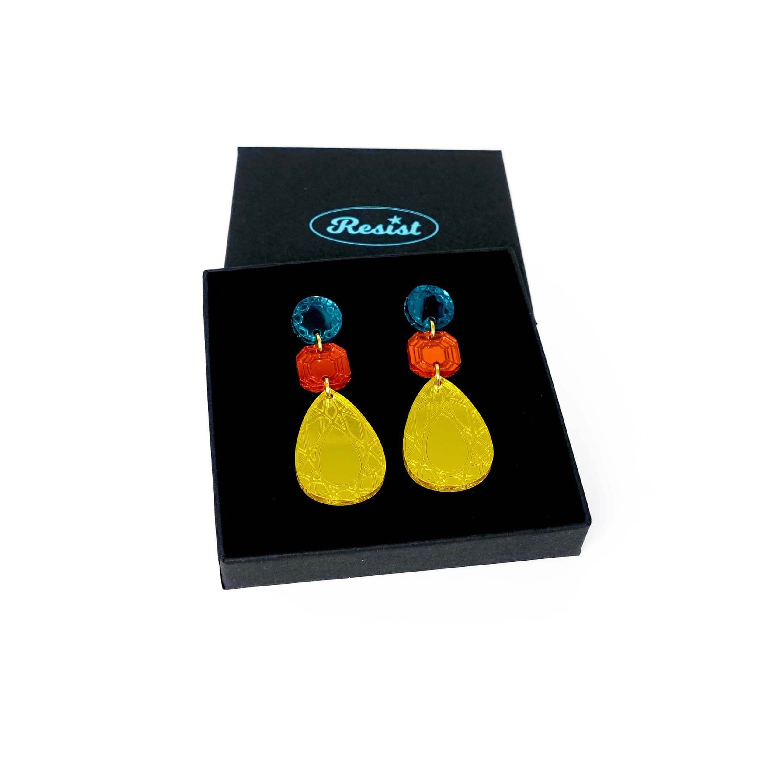 Large Belle Époque Jewel drop earrings in Flame Mambo: yellow, flame and teal colours. Shown in a Wear and Resist gift box. 