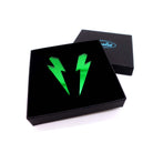 Large Lightning Bolt earrings in envy green mirror, shown in a Wear and Resist gift box.