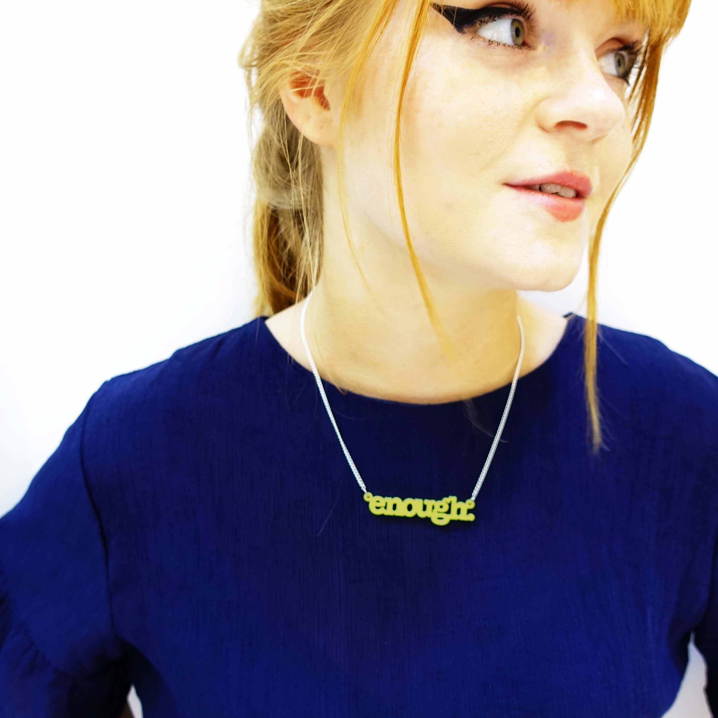 Eliza wears Enough necklace in matte lemon.