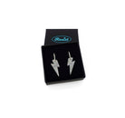 Lightning bolt hoop earrings in silver glitter on silver-plated hoops, shown  in a small Wear and Resist gift box.