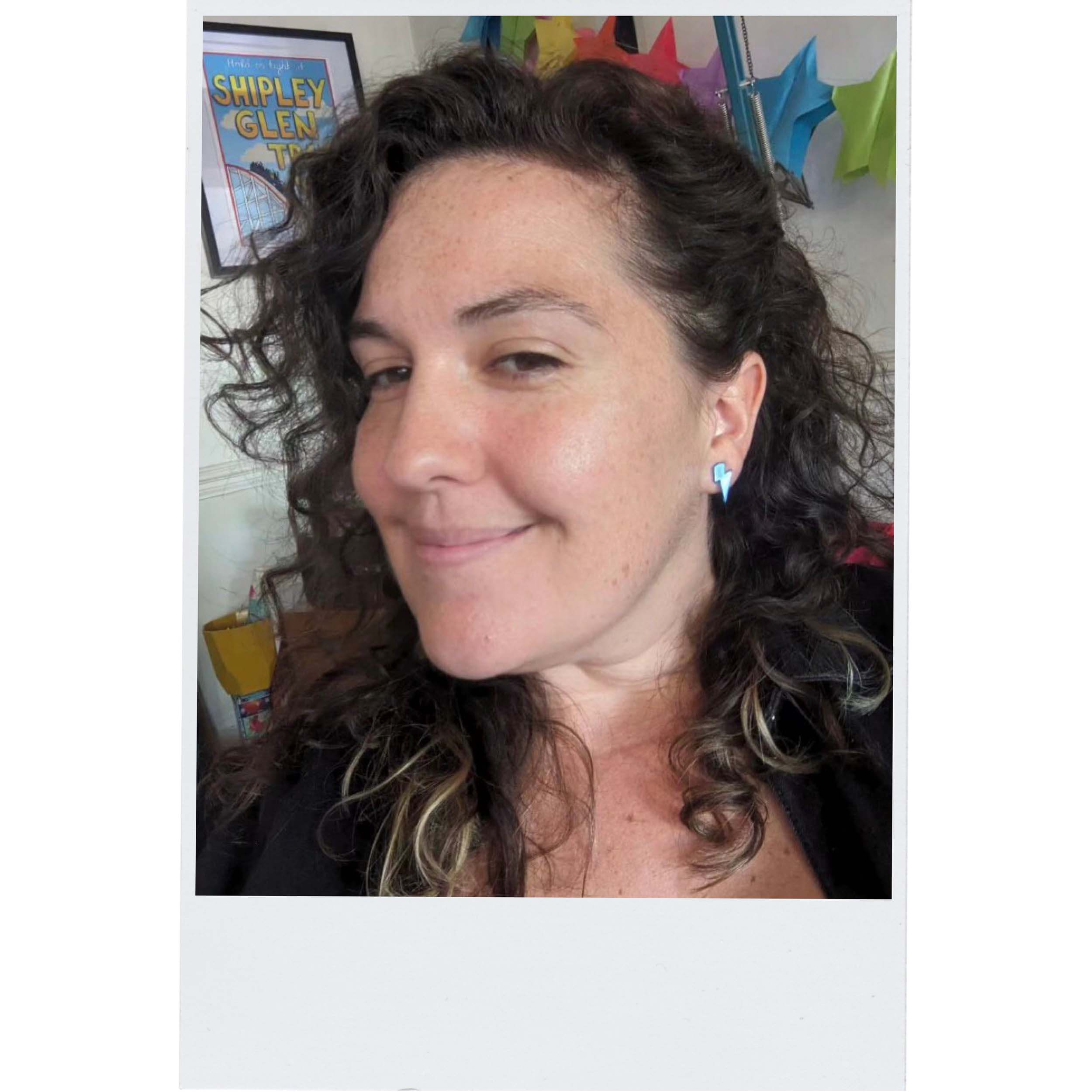 Tiny mirror Lightning Bolt earrings from Wear and Resist, as worn by the Persisterhood!