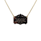 It's all a load of bollocks and bollocks to it all in bronze shown hanging on a gold-plated stainless steel chain.