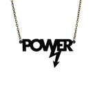 Matte black large Power necklace on a black chain, designed in collaboration with Mary Beard to celebrate her book, Women & Power.