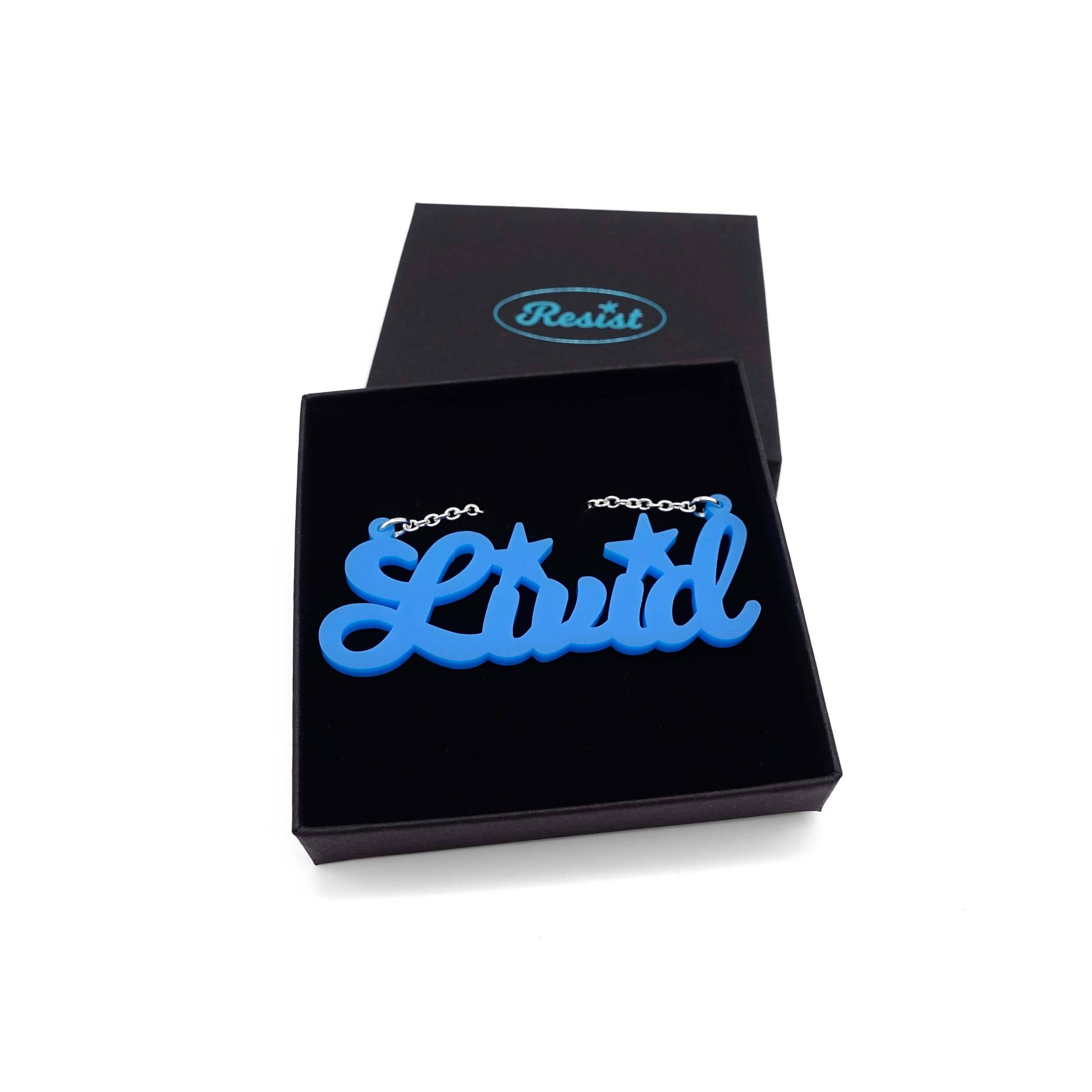 Livid necklace in matte bright blue, shown in a Wear and Resist gift box.