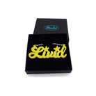 Livid necklace in matte lemon, shown in a Wear and Resist gift box.