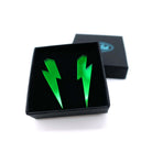 Medium Lightning Bolt earrings in envy green mirror, shown in a small Wear and Resist gift box.
