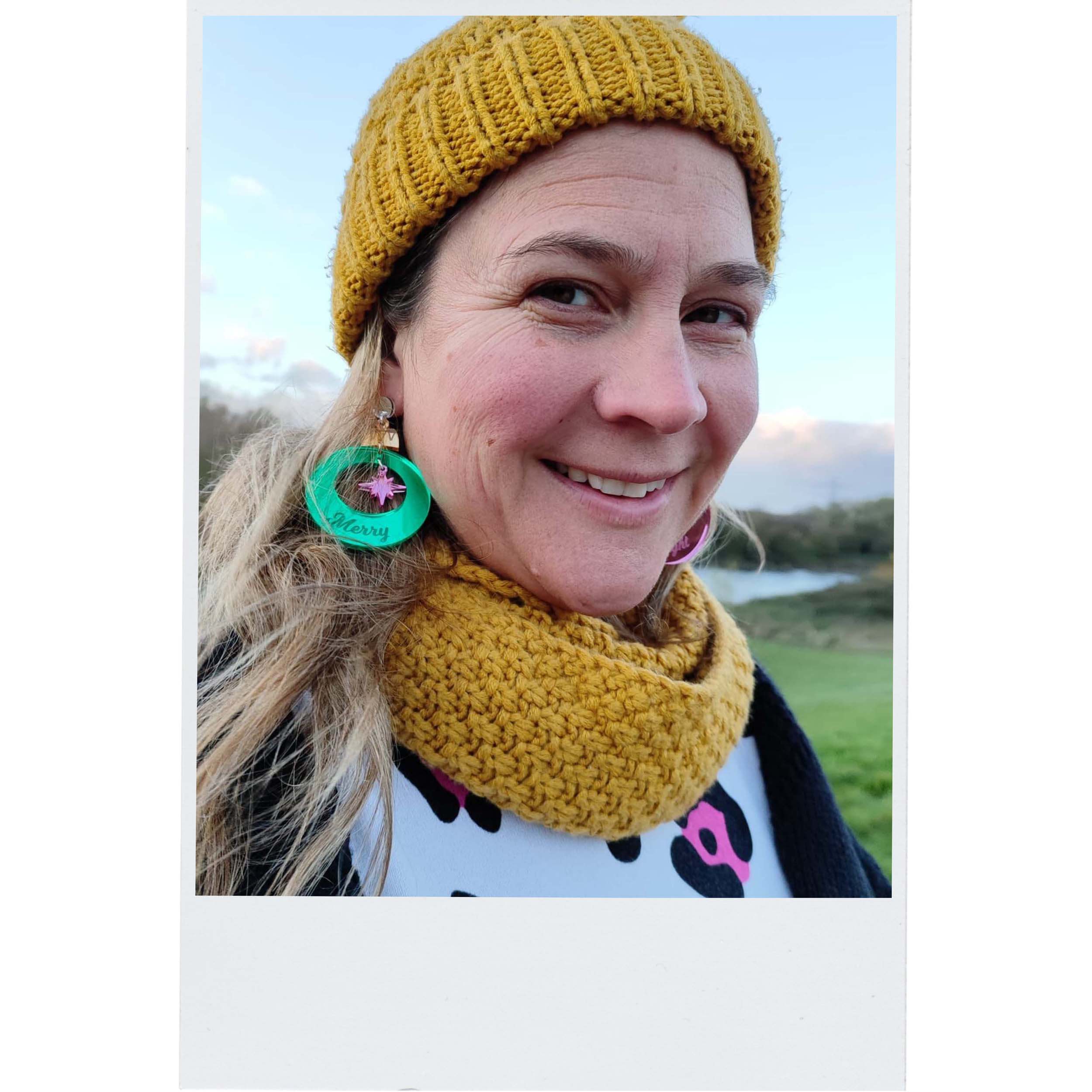 Merry & Bright Christmas bauble earrings in electric green and pink mirror, as worn by the Persisterhood!