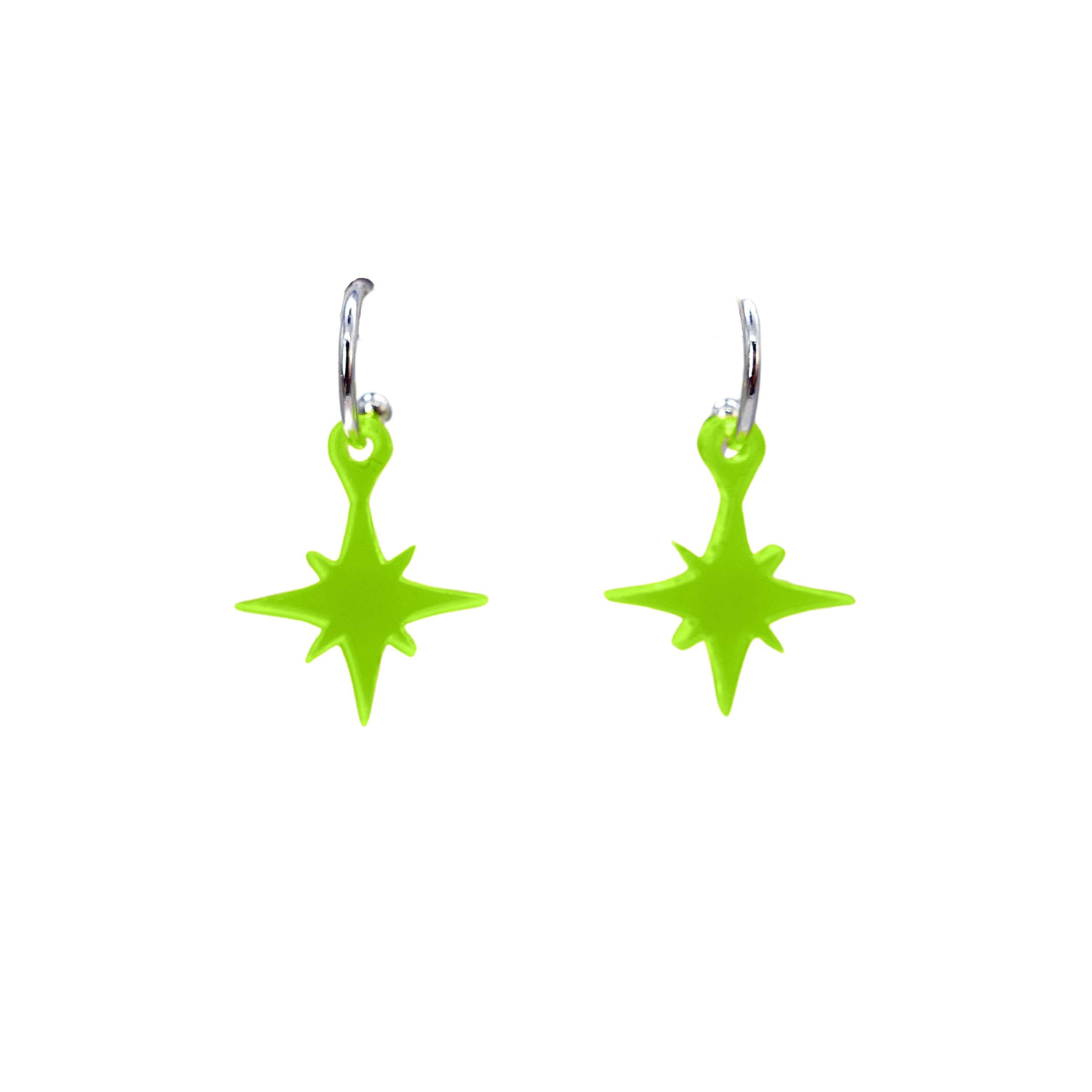 Vintage star earrings in neon green shown on silver hoops against a white background.