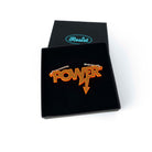 Mini power necklace in fluoro orange shown in a Wear and Resist gift box.