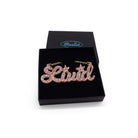 Livid necklace in pink fizz glitter, shown in a Wear and Resist gift box.
