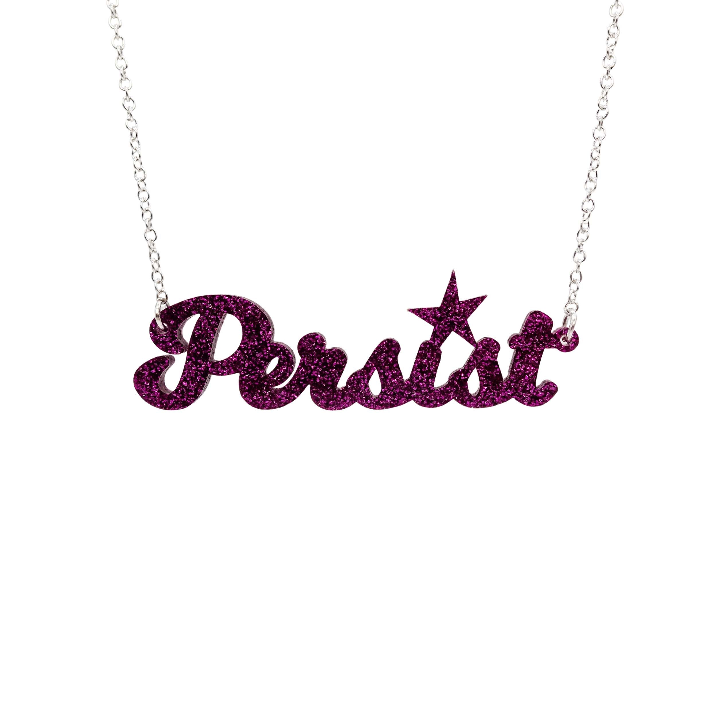 Persist necklace in script font in purple glitter, shown hanging on a white background.