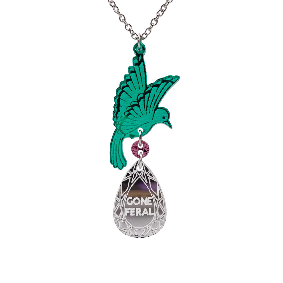 An acrylic pendant necklace with a green bird holding a silver 'jewel' that says 'Gone Feral'.