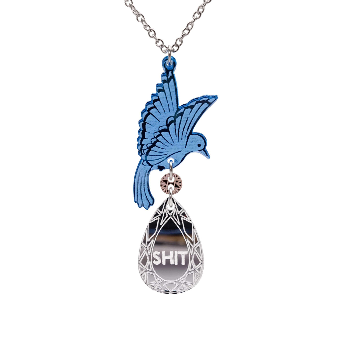 An acrylic pendant necklace with a blue bird holding a silver 'jewel' that says 'Sh*t'.