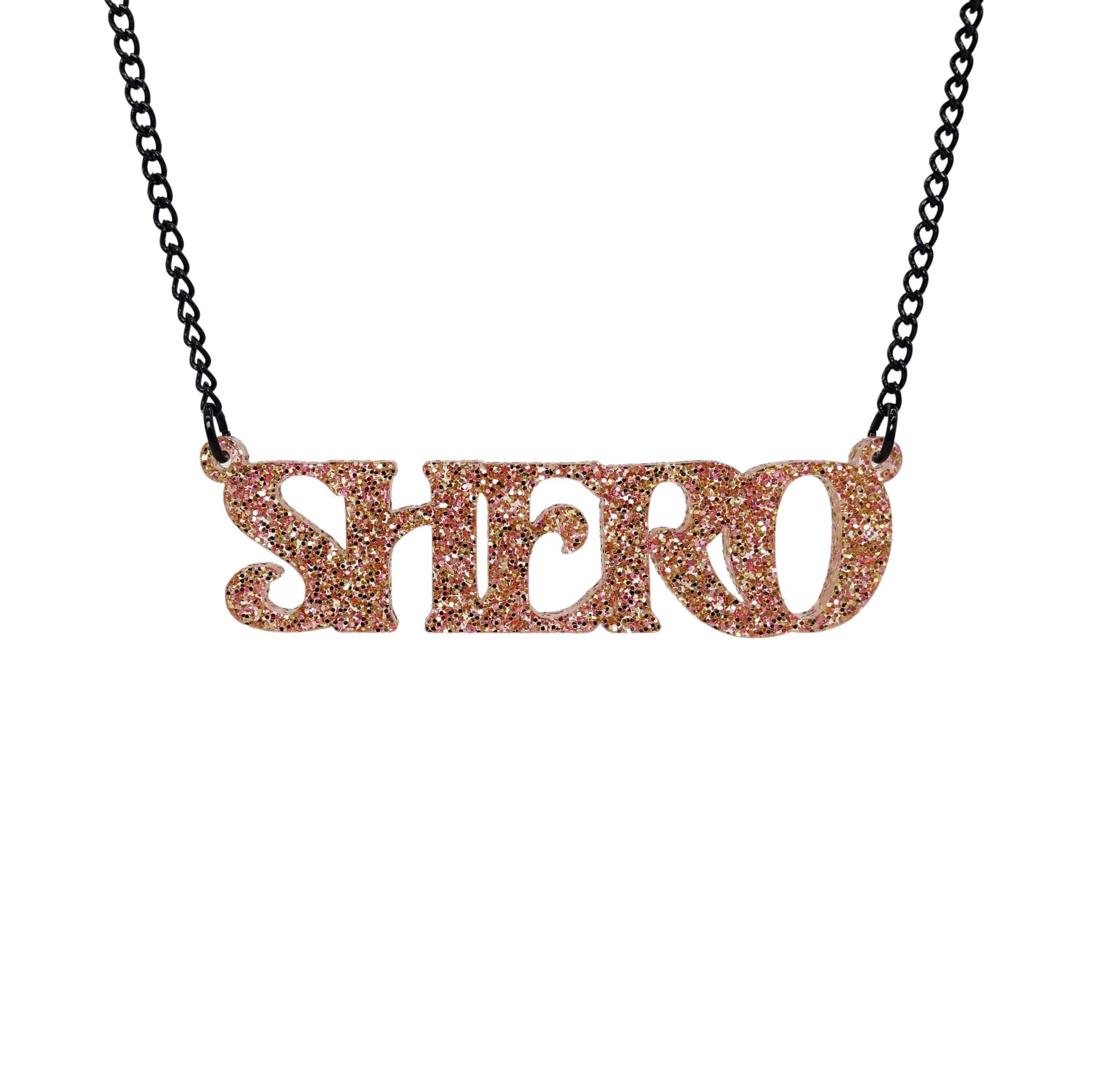 Shero necklace in pink fizz glitter. It's a heroine's journey and you are the main character!