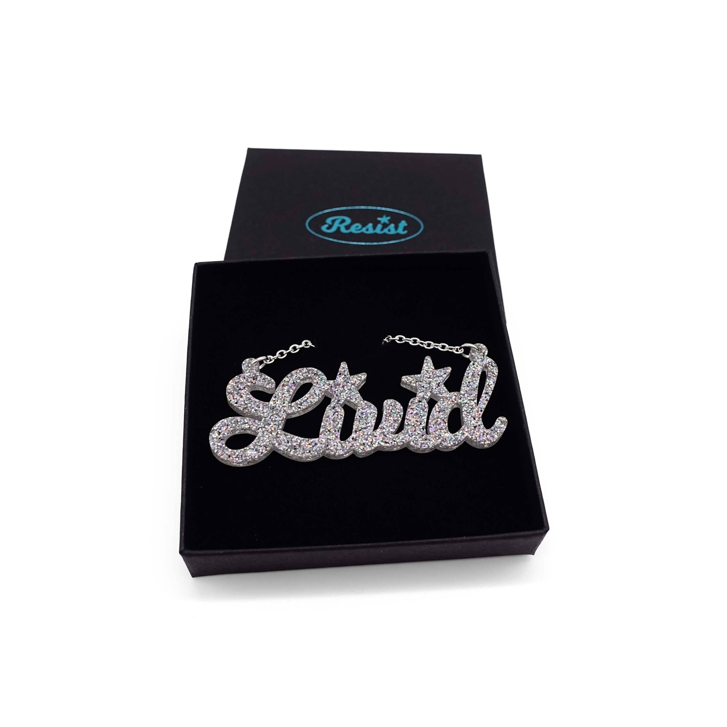 Livid necklace in silver glitter, shown in a Wear and Resist gift box.