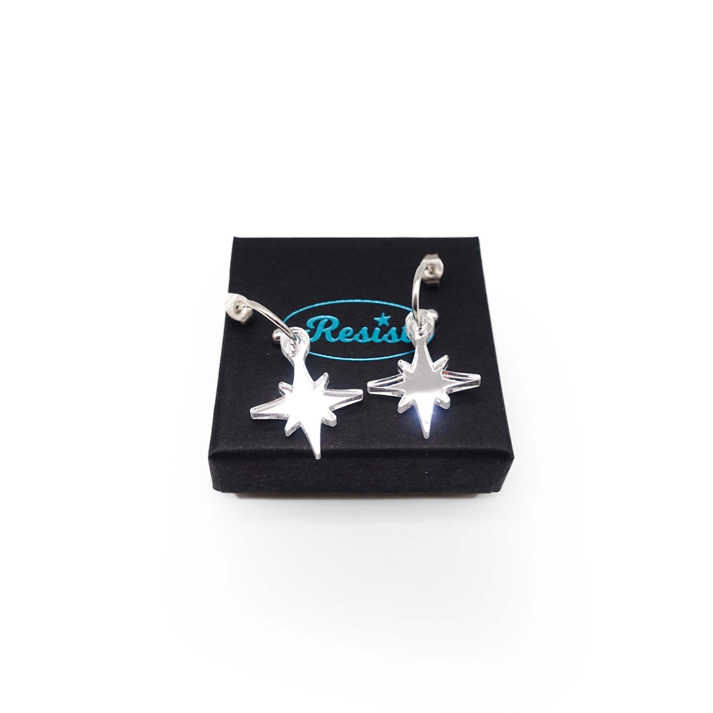 Silver mirror limited edition Festive Vintage Star earrings, shown on a Wear and Resist gift box.