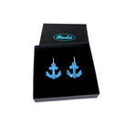 Medium anchor earrings in sky mirror etched with the words 'courage' on one and 'hold fast' on the other. Shown in a Wear and Resist gift box.