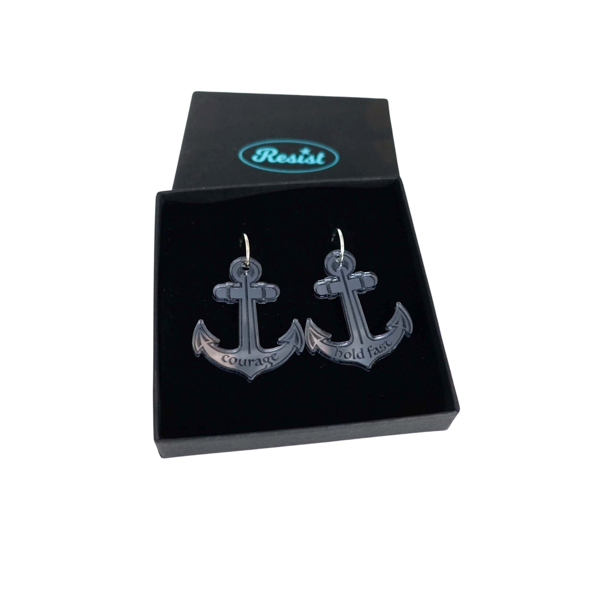 Courage and Hold Fast anchor hoop earrings in slate mirror, shown in a Wear and Resist gift box.