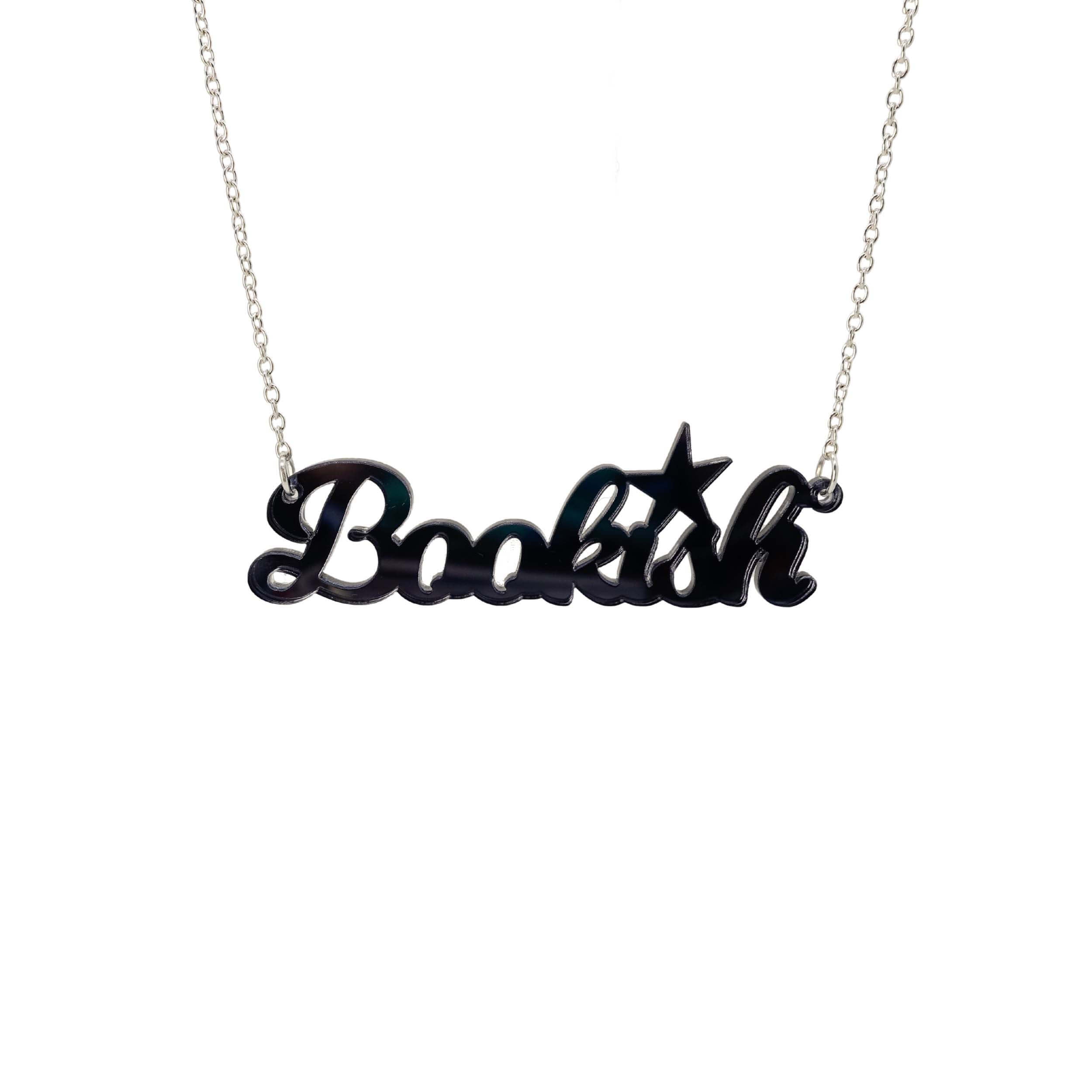 Bookish necklace in slate mirror shown against a white background.
