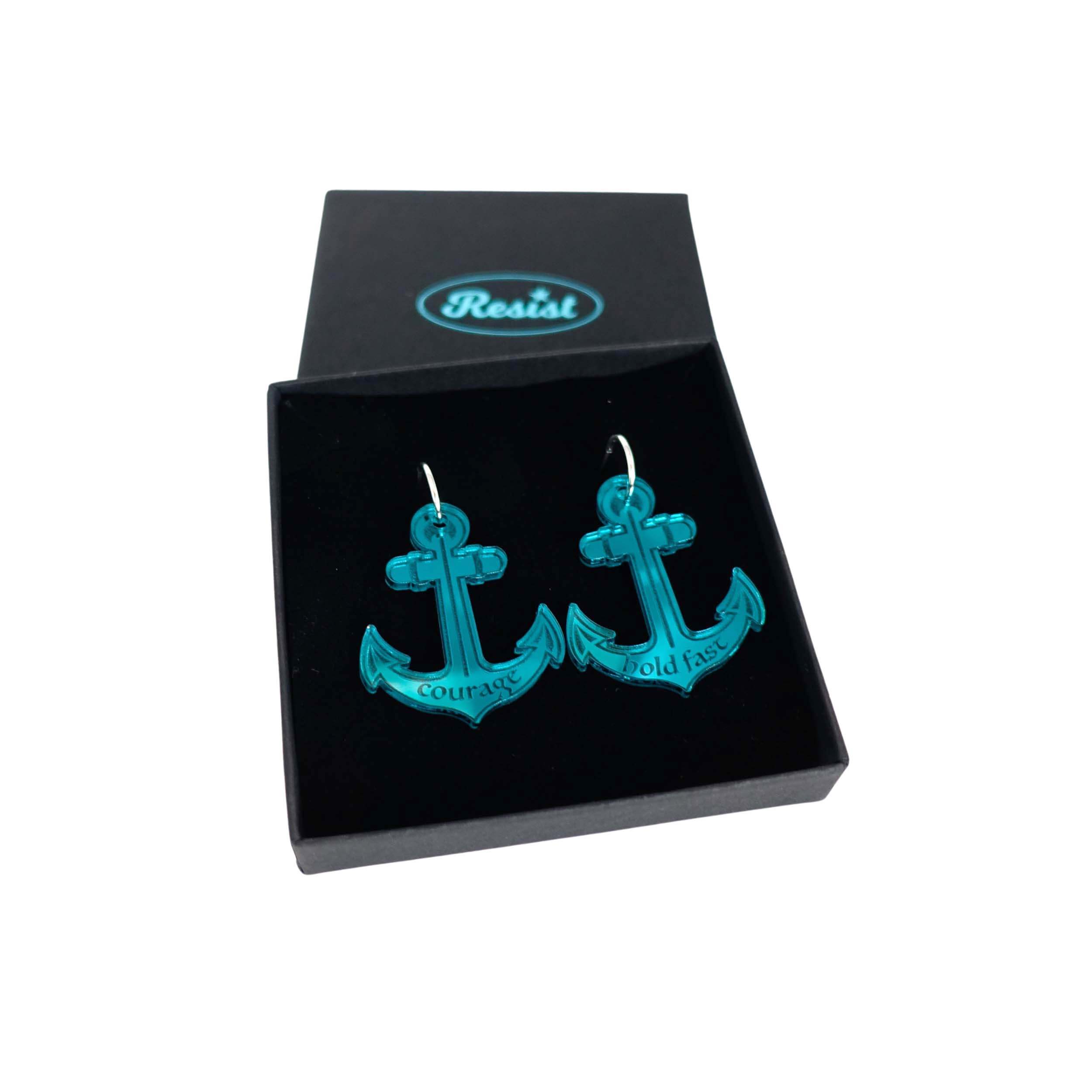 Courage and Hold Fast anchor hoop earrings in teal mirror, shown in a Wear and Resist gift box.
