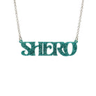 Teal glitter Shero necklace shown in a Wear and Resist gift box.