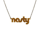 Nasty necklace in ultra gold glitter, shown hanging against a white background. Stay nasty you nasty woman!