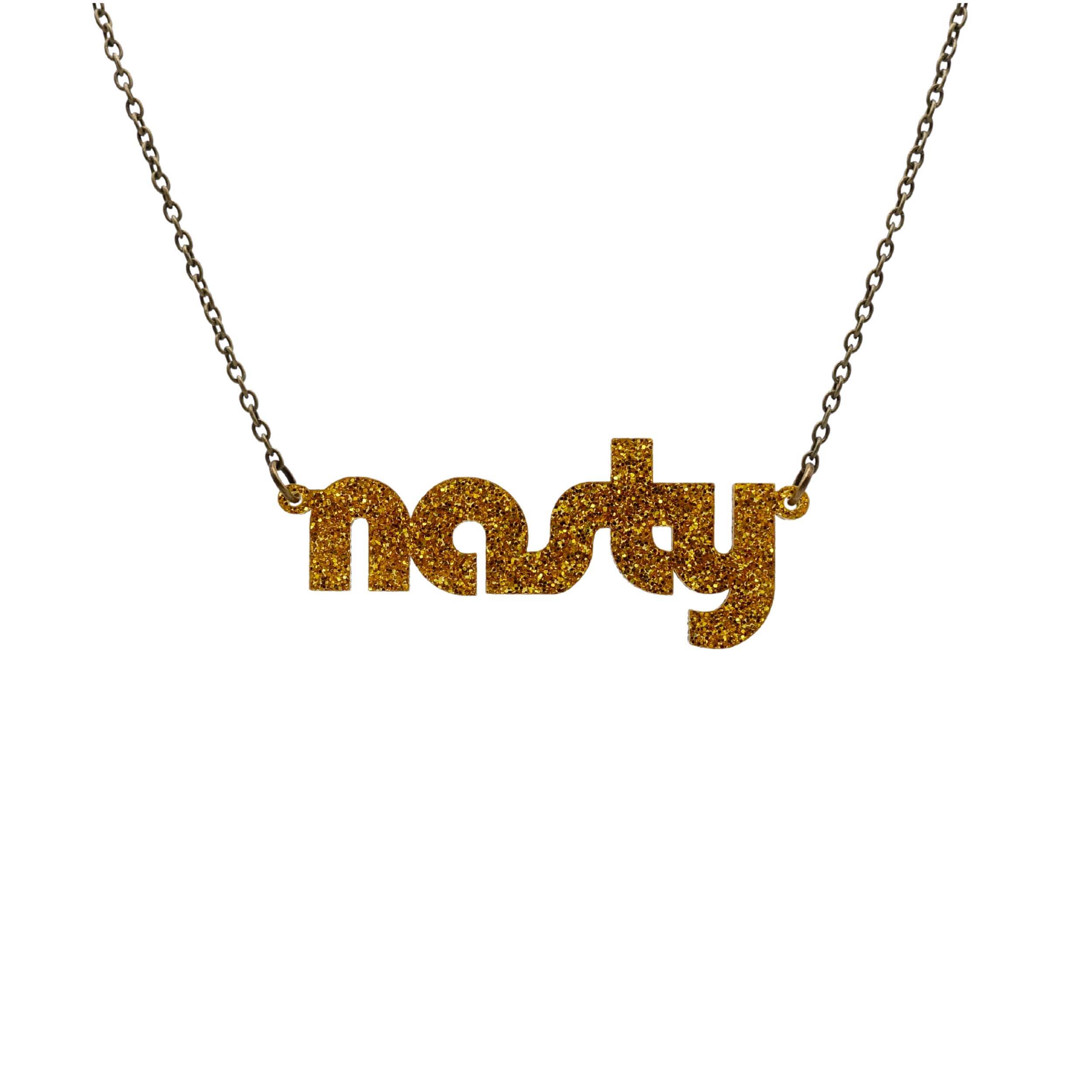 Nasty necklace in ultra gold glitter, shown hanging against a white background. Stay nasty you nasty woman!