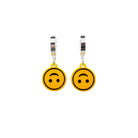 Upside-down smiley face emoji earrings on silver huggie hoops, shown hanging against a white background.