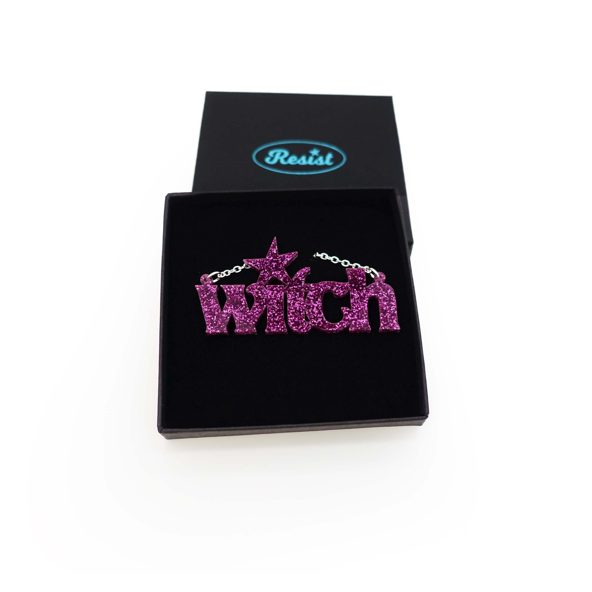 Purple glitter Witch necklace in a Wear and Resist gift box.