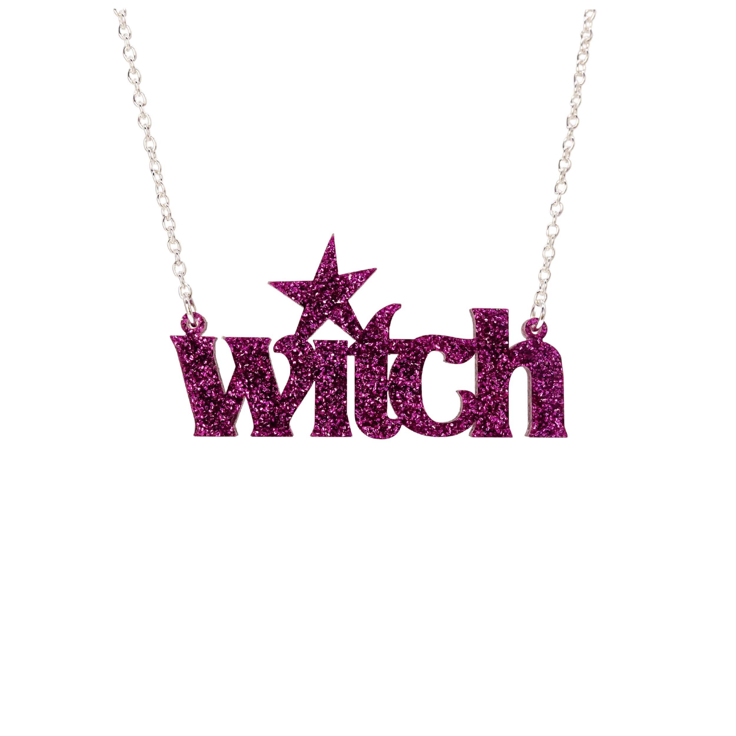 Purple glitter Witch necklace shown hanging against a white background.