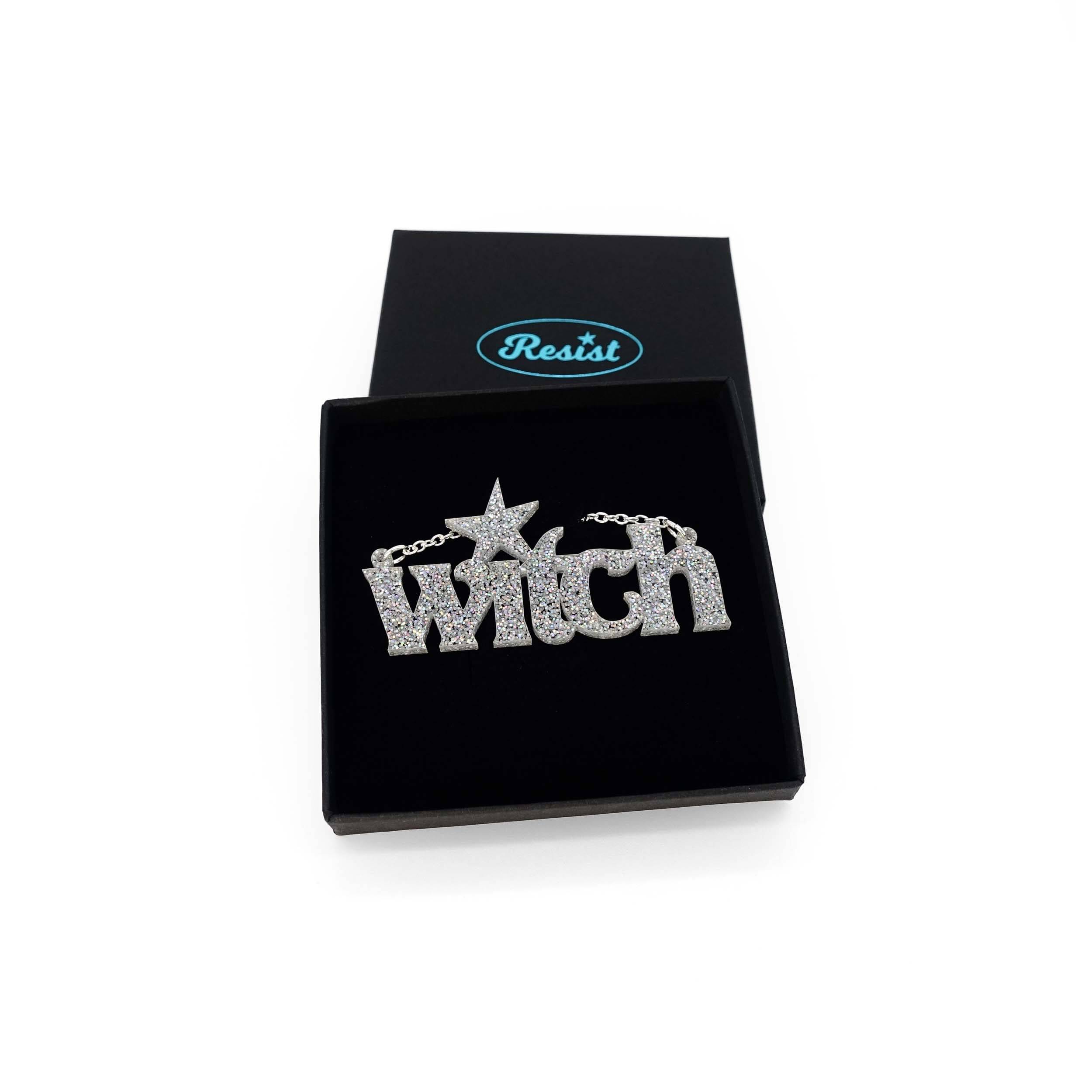 Silver glitter Witch necklace in a Wear and Resist gift box.