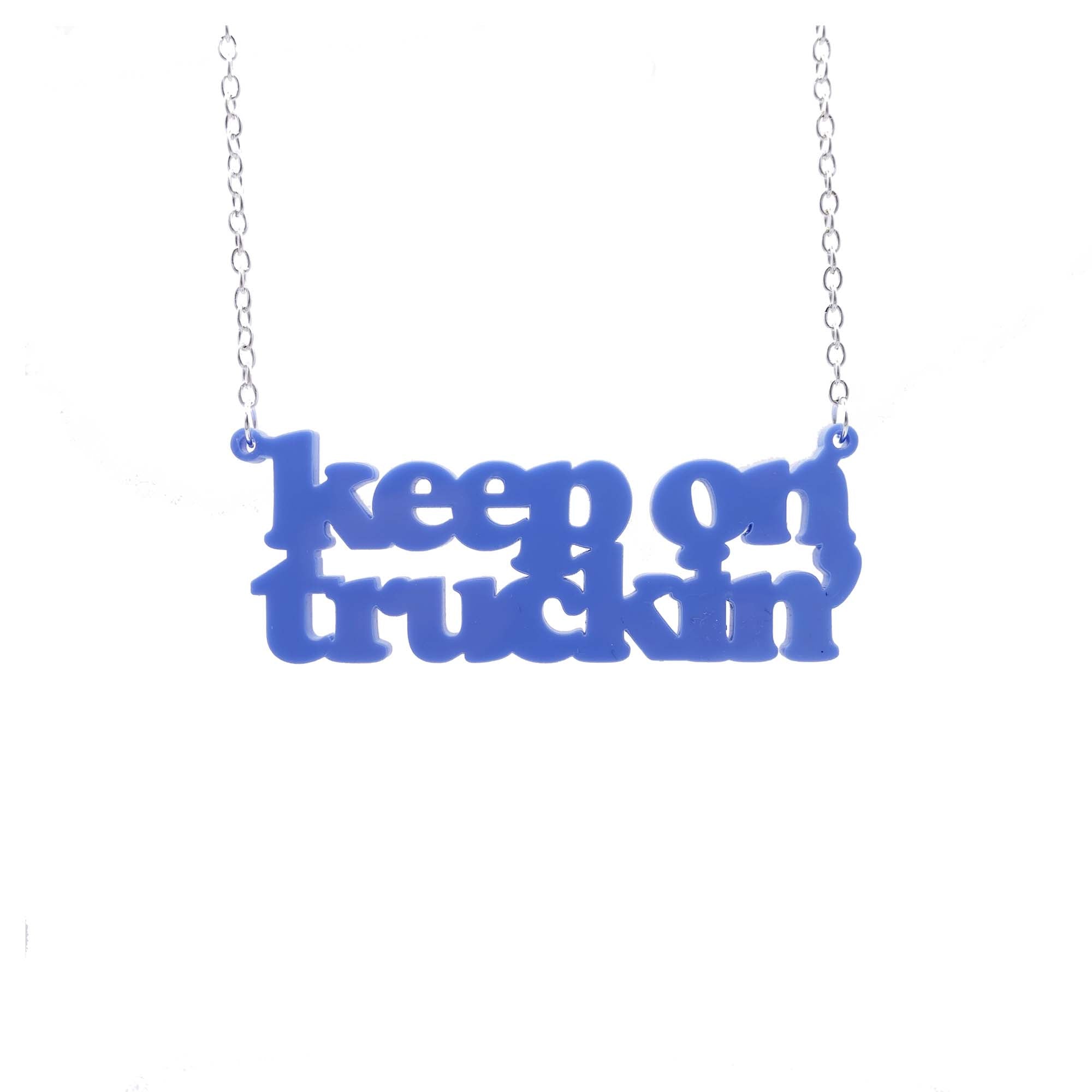 VW blue keep on truckin necklace hanging