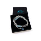 The Have a Word with Yourself design on a silver-plated paperclip chain, with any two combinations of your own words etched in glow-in-the-dark pigment and finished with a charm of your choice, shown here with a star in a Wear and Resist gift box.