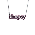Cassis chopsy necklace shown hanging against a white background.