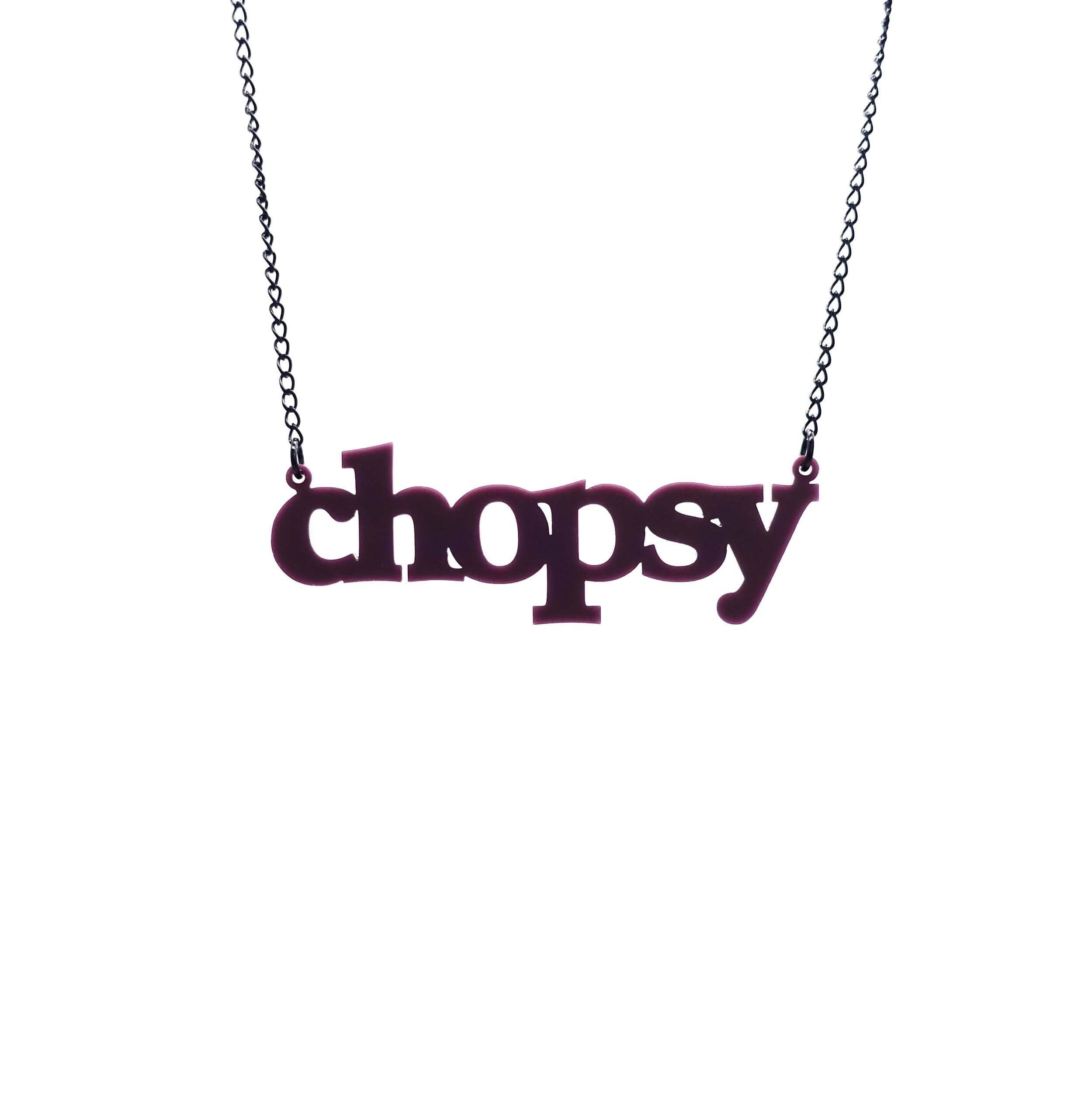 Cassis chopsy necklace shown hanging against a white background.