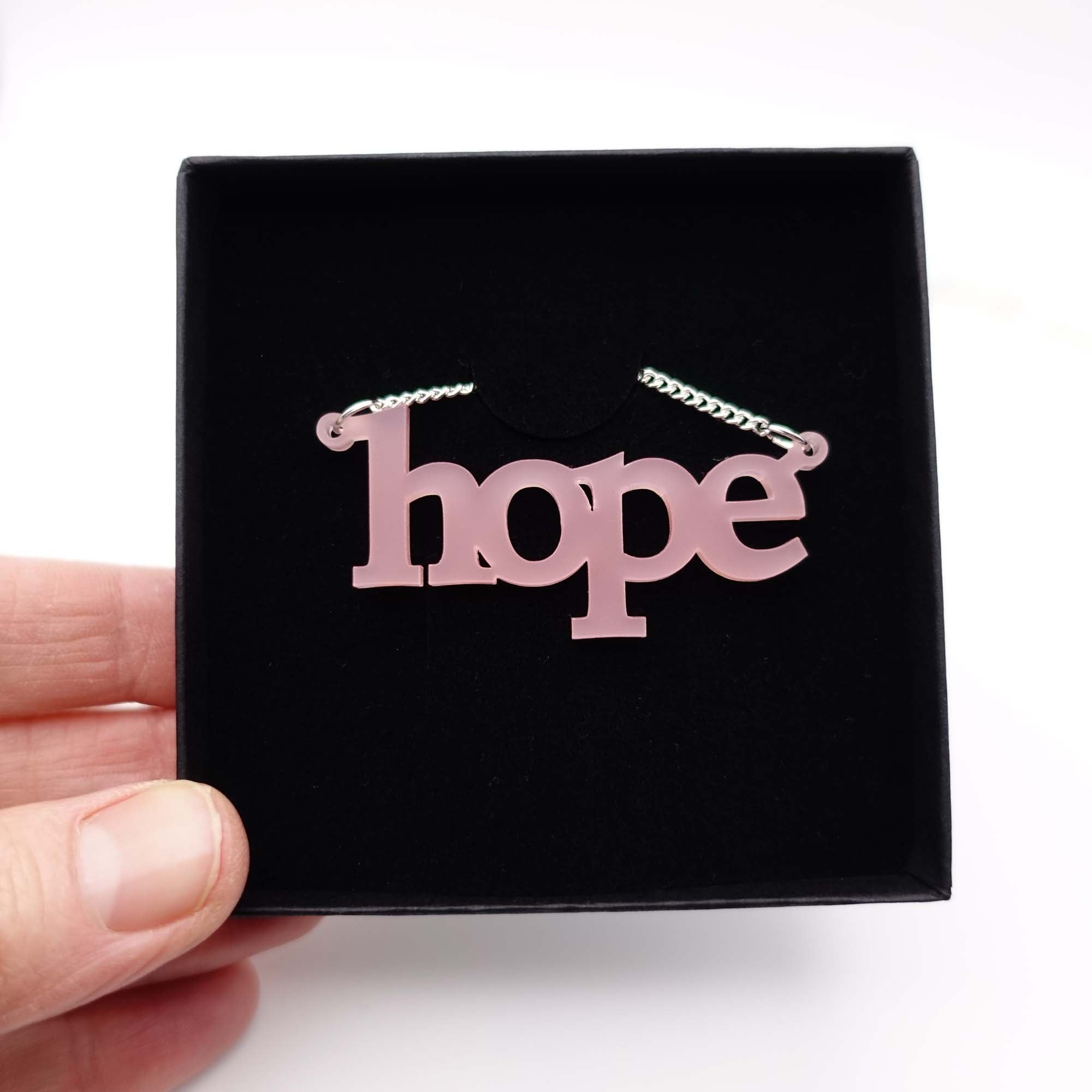 Blush frost Hope necklace in a Wear and Resist gift box.