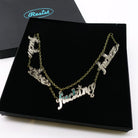 F*ck these F*cking F*ckers necklace in bronze mirror, shown in a large Wear and Resist gift box.