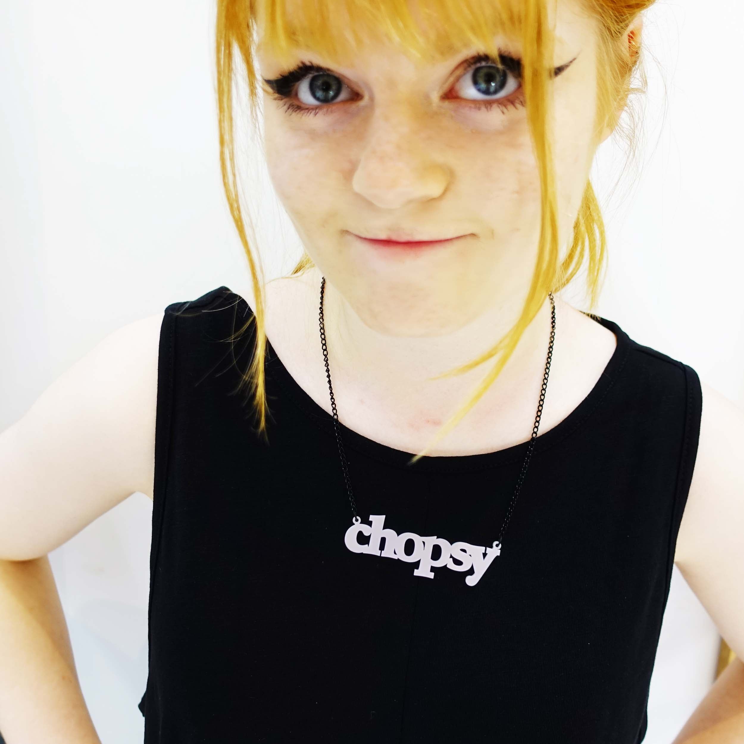 Eliza wears a chalk pink Chopsy necklace.