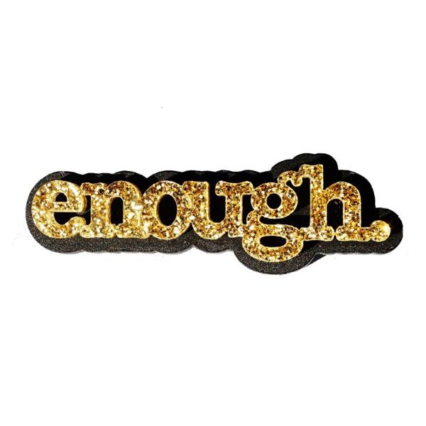 Enough brooch in gold glitter.