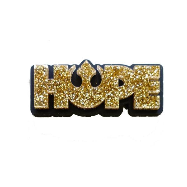 Hope Rebel Alliance brooch in gold glitter.