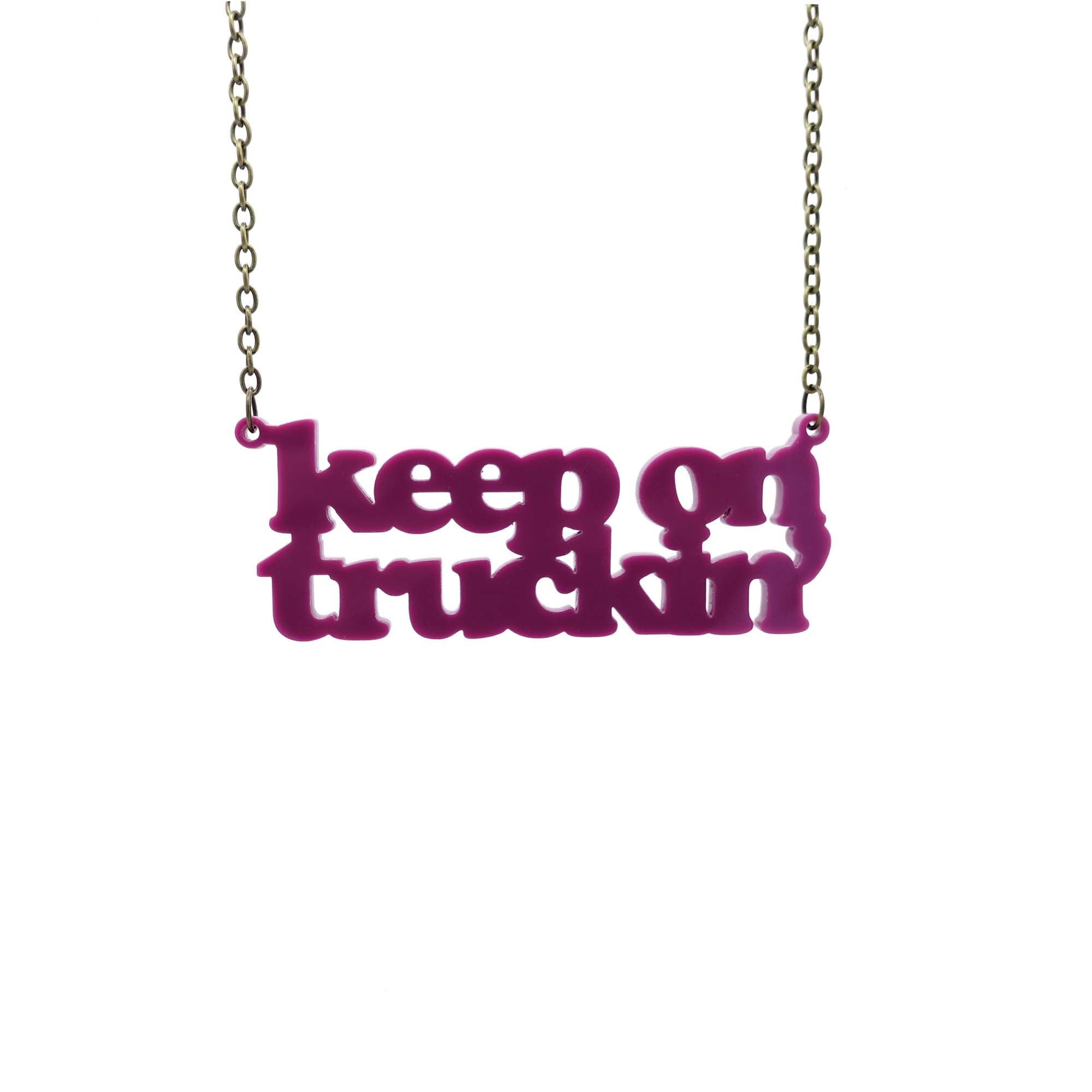 maroon Keep on Truckin' necklace hanging