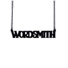 A necklace that says 'Wordsmith' in matte black, shown hanging against a white background.